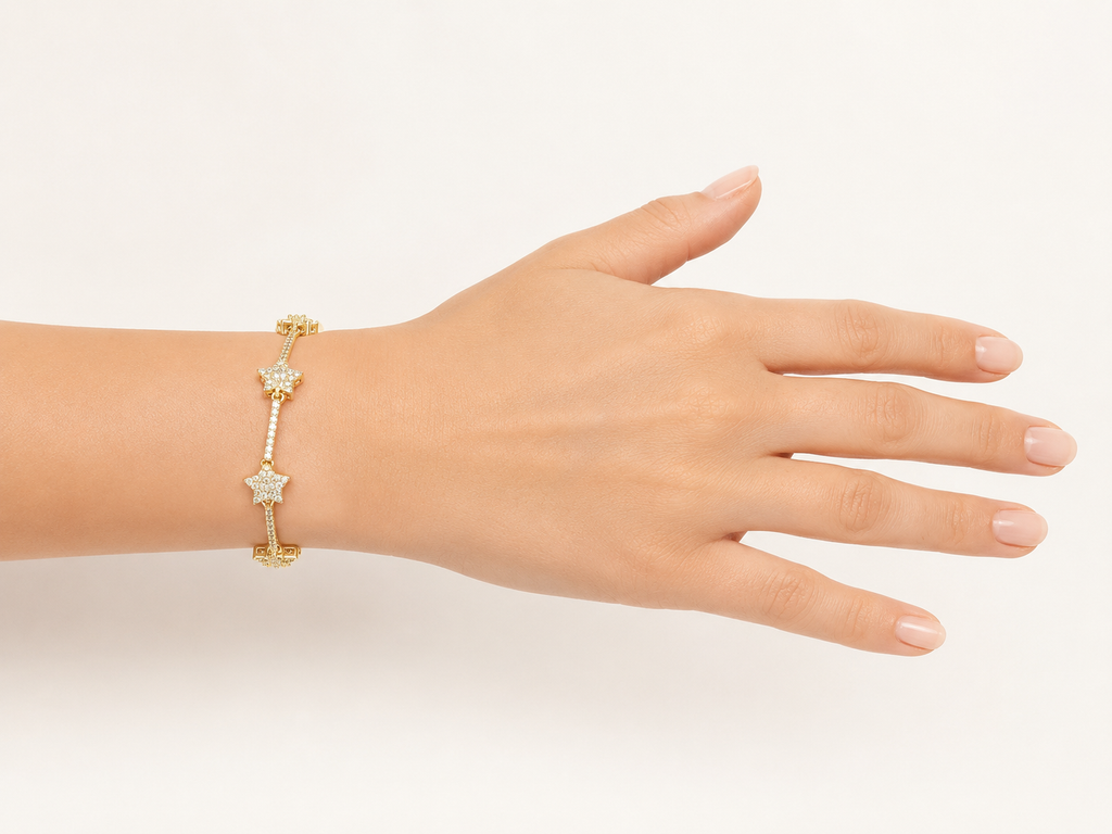 Gold-Tone Brass Star Charm Bracelet with Crystal Accents