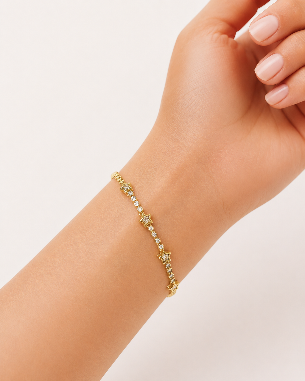 Gold-Tone Brass Star Charm Tennis Bracelet with Crystal Accents