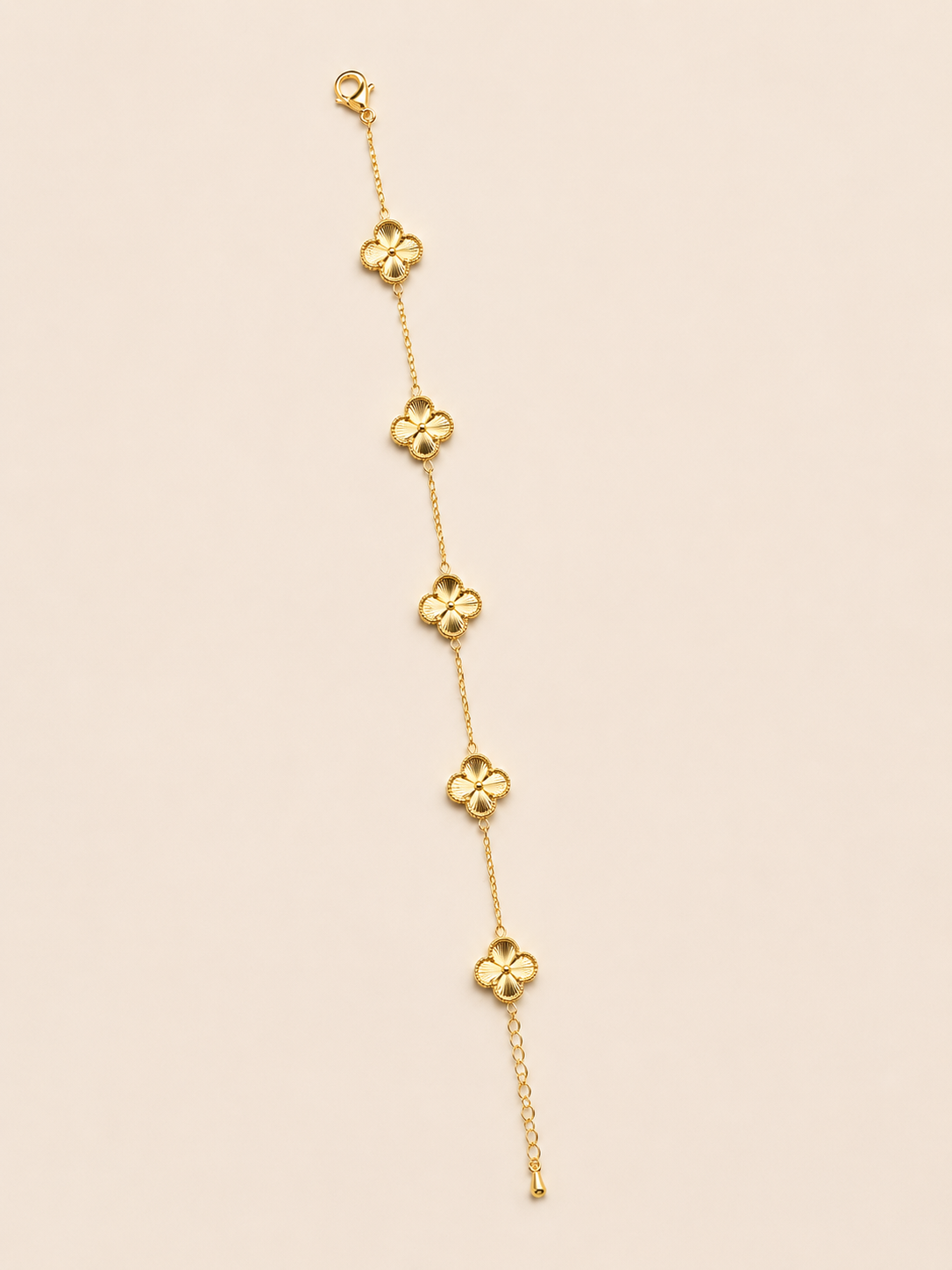 Gold-Tone Brass Four-Leaf Clover Bracelet with Textured Charms