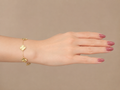 Gold-Tone Brass Four-Leaf Clover Bracelet with Textured Charms